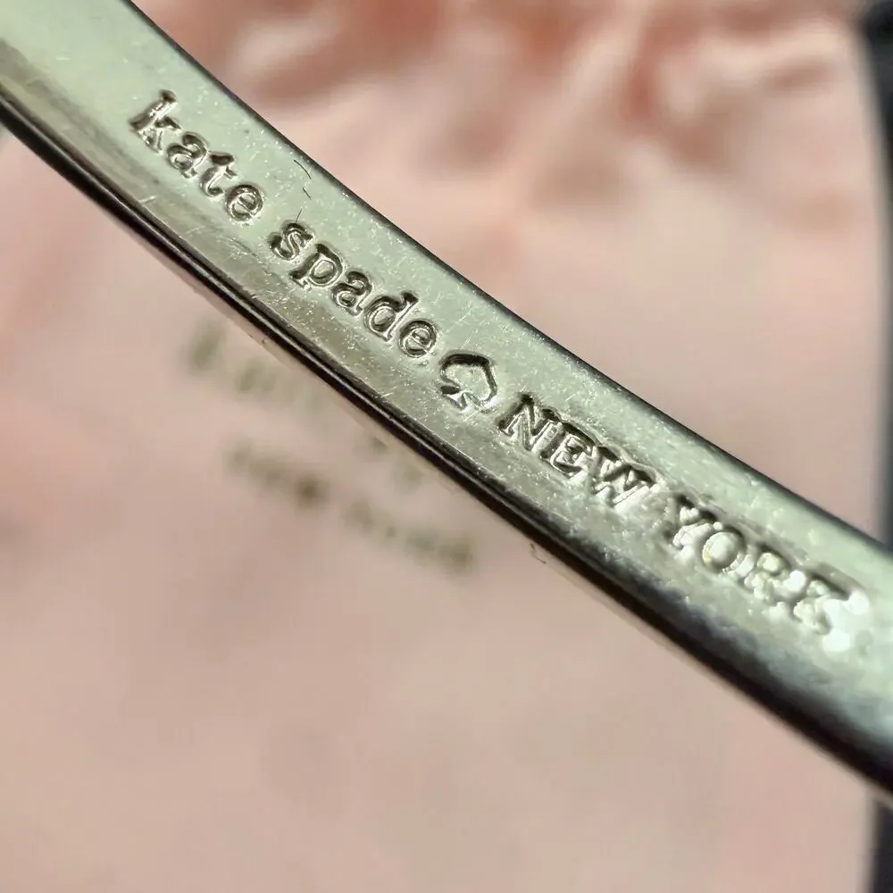 Kate Spade Love Notes Silver Tone Large Bow Hinge Bracelet